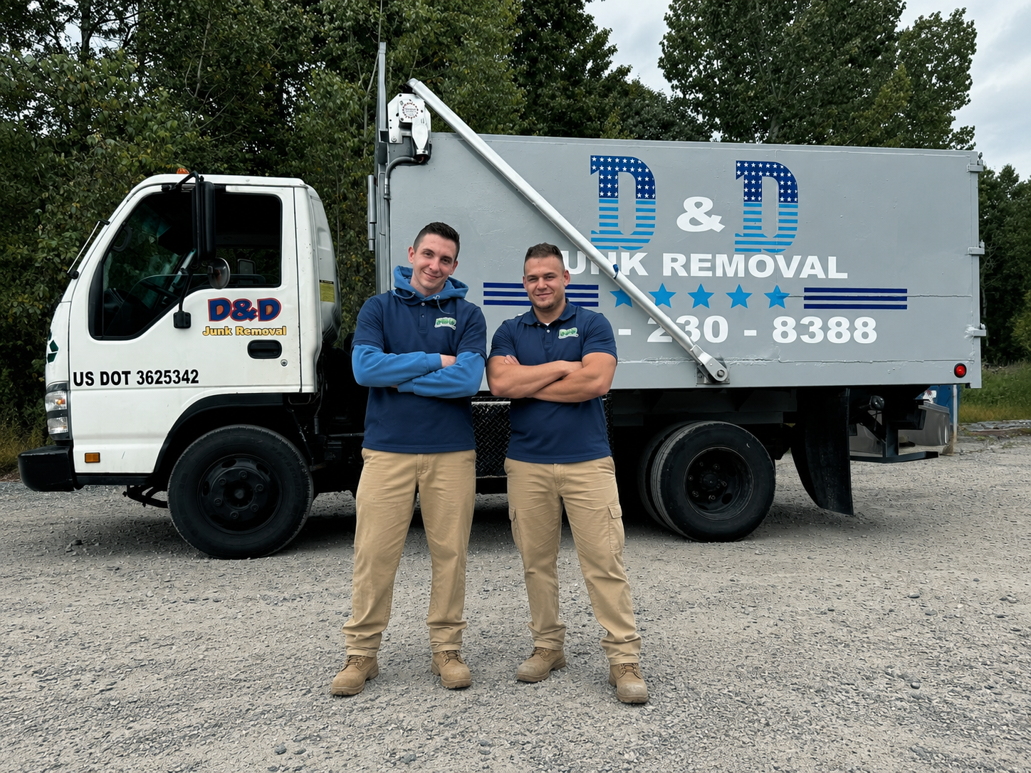 D&D Junk Removal crew with branded truck in Worcester County